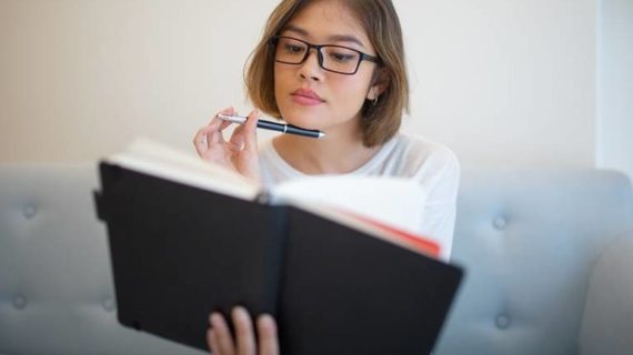 pensive young woman thinking