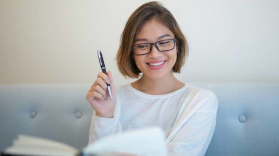 happy woman reading book