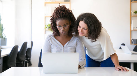 Teaching her colleagues to work online.