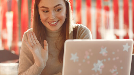 cheerful woman waving hand