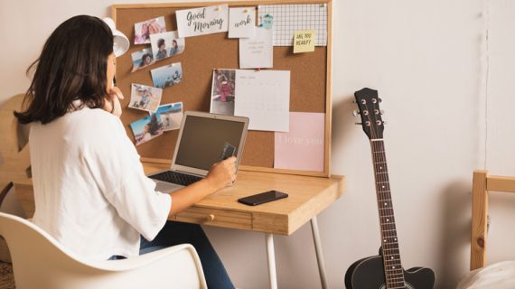 Casual dressed woman working from home