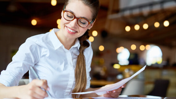 smiling woman while working