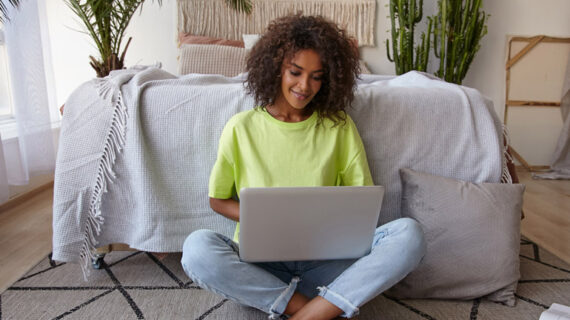 beautiful young woman working on laptop