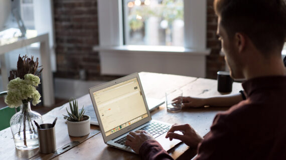 Man at a laptop in an office