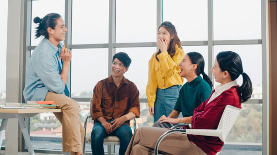 Group of young college students in smart casual wear