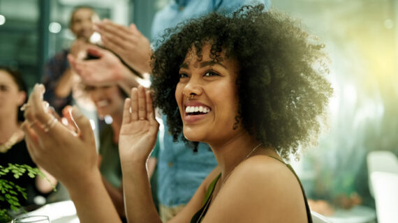 happy woman clapping hands