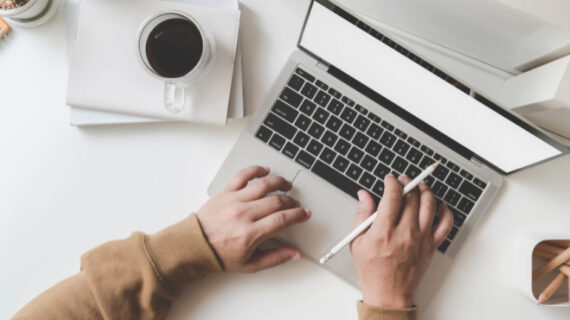 adult woman working using her laptop