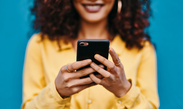 woman holding phone