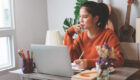 woman creative freelancer working on laptop computer