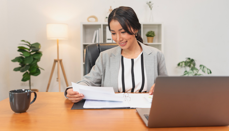 Young asian businesswoman working in office