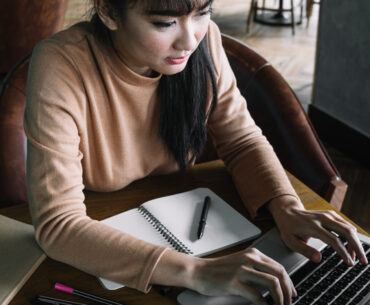 Girl typing on laptop